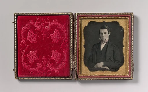 [Young Man with Up-turned Collar and Bow Tie]