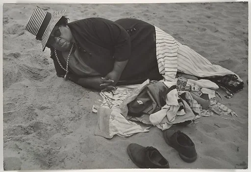 [Beach Scene: Woman Wearing Striped Hat and Dark Jacket, Coney Island, New York]