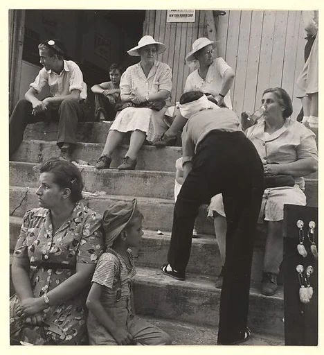 [Crowd on Steps of New York Rubber Corporation, New York]