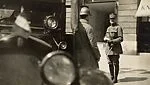 [Marshal Foch on Street with Automobile in Foreground]