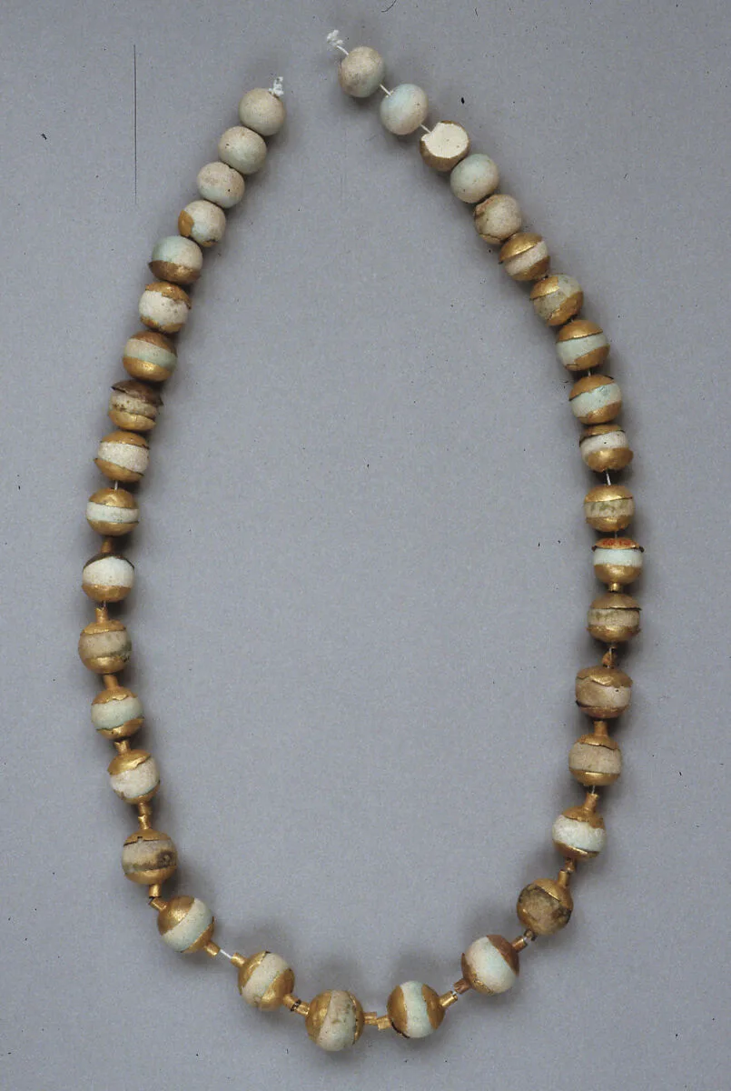 Globular Beads with Caps, Strung as a Necklace — Unknown
