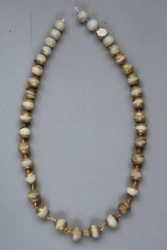 Globular Beads with Caps, Strung as a Necklace