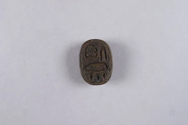 Oval plaque with hieroglyphs — Unknown