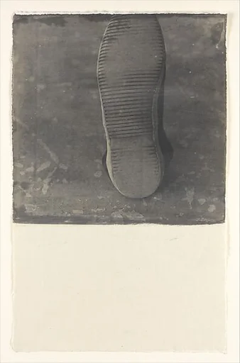 [Sole of Tennis Shoe]