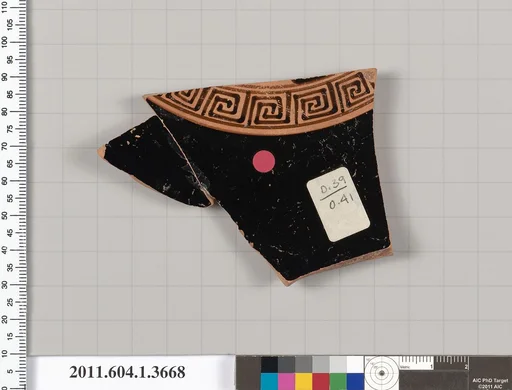 Terracotta fragment of a kylix (drinking cup)