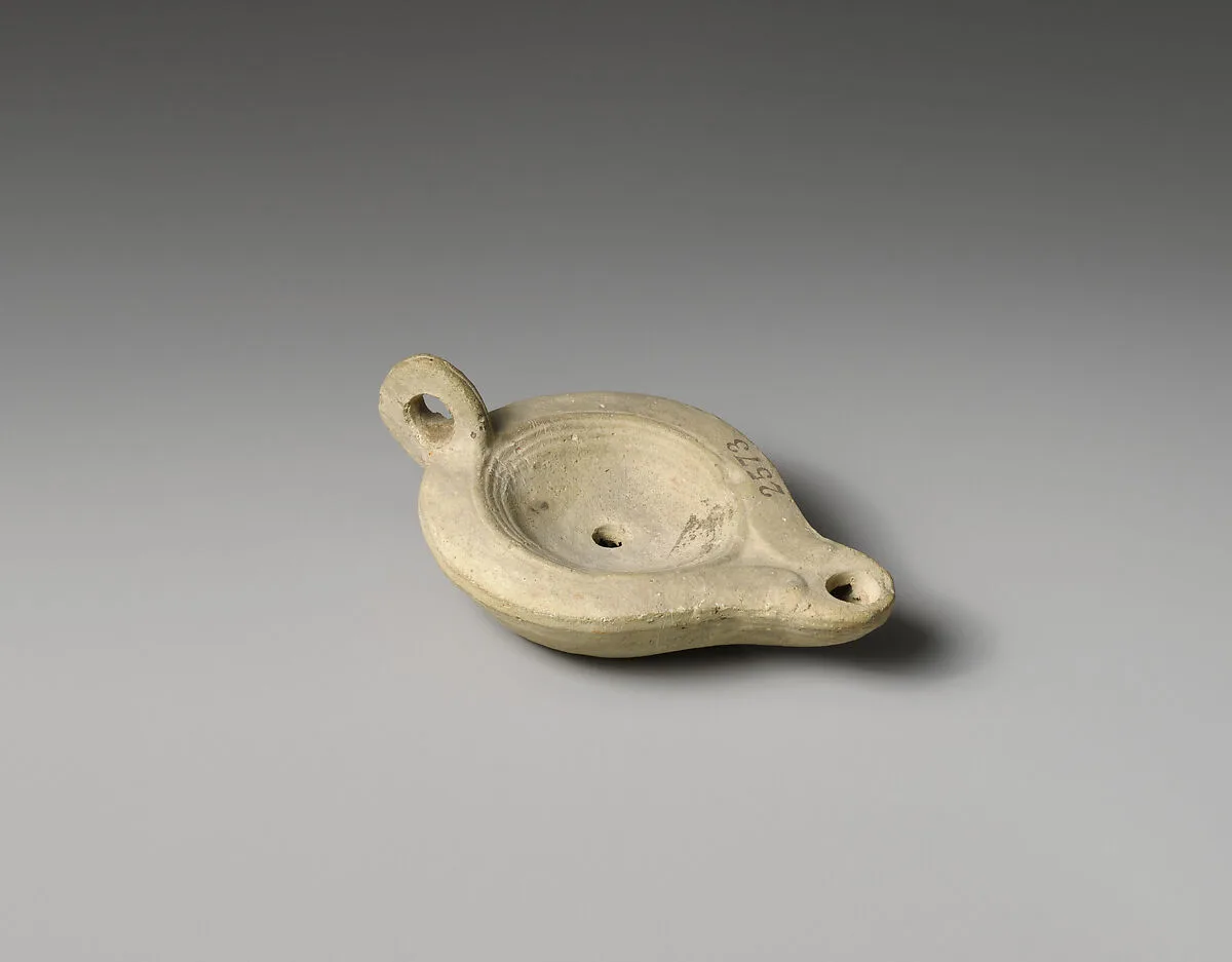 Terracotta oil lamp — Unknown