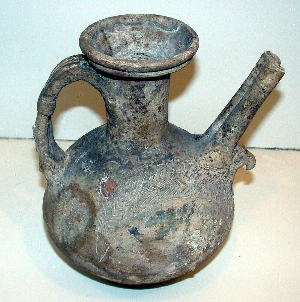 Spouted jar with eagle incised in high relief — Unknown