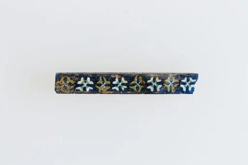 Inlay with row of rosettes