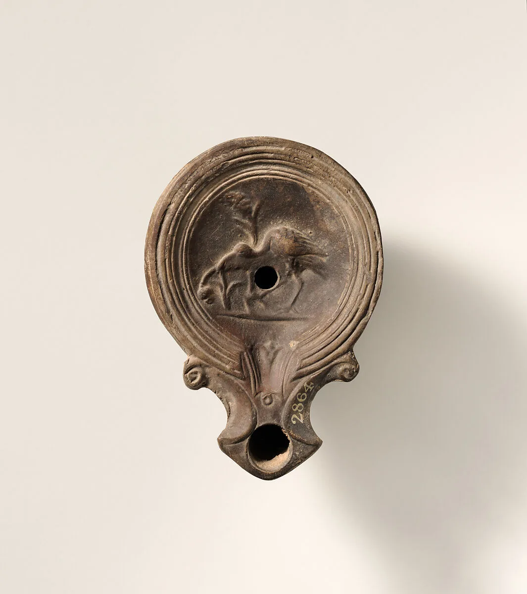 Terracotta oil lamp — Unknown