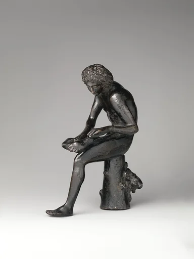 Spinario (boy pulling a thorn from his foot)