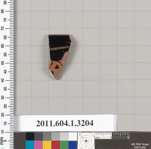 Terracotta rim fragment of a kylix (drinking cup)