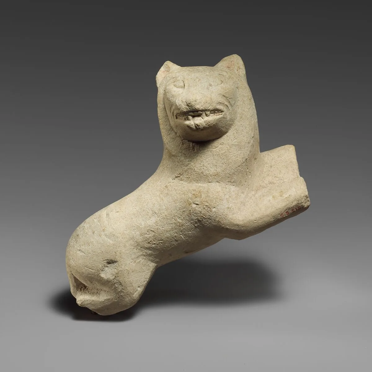 Limestone lion probably from a statue of Herakles — Unknown