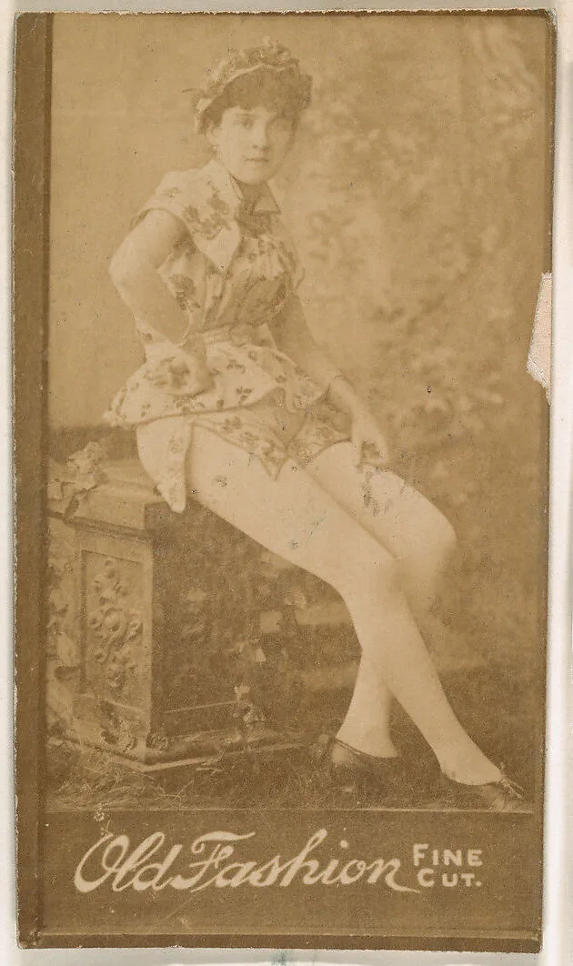 Actress seated on bench, from the Actresses series (N664) promoting Old Fashion Fine Cut Tobacco — Unknown