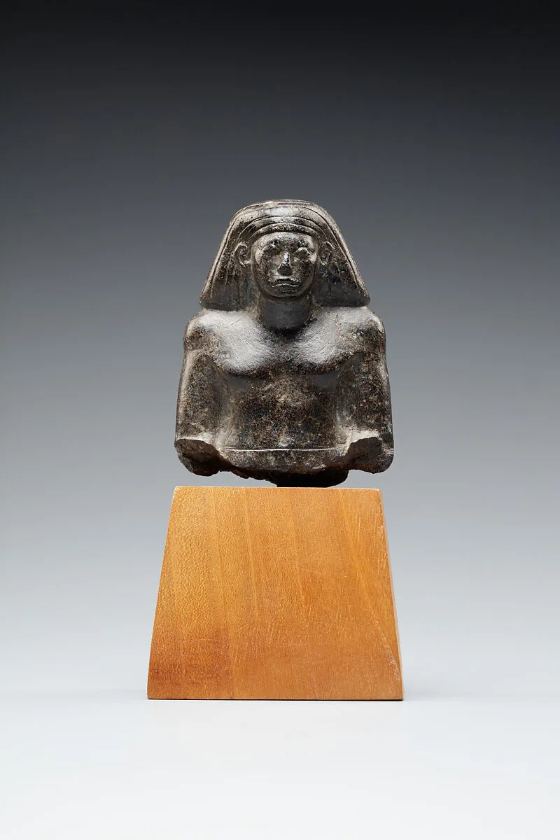 Upper part of a figure of a seated official — Unknown