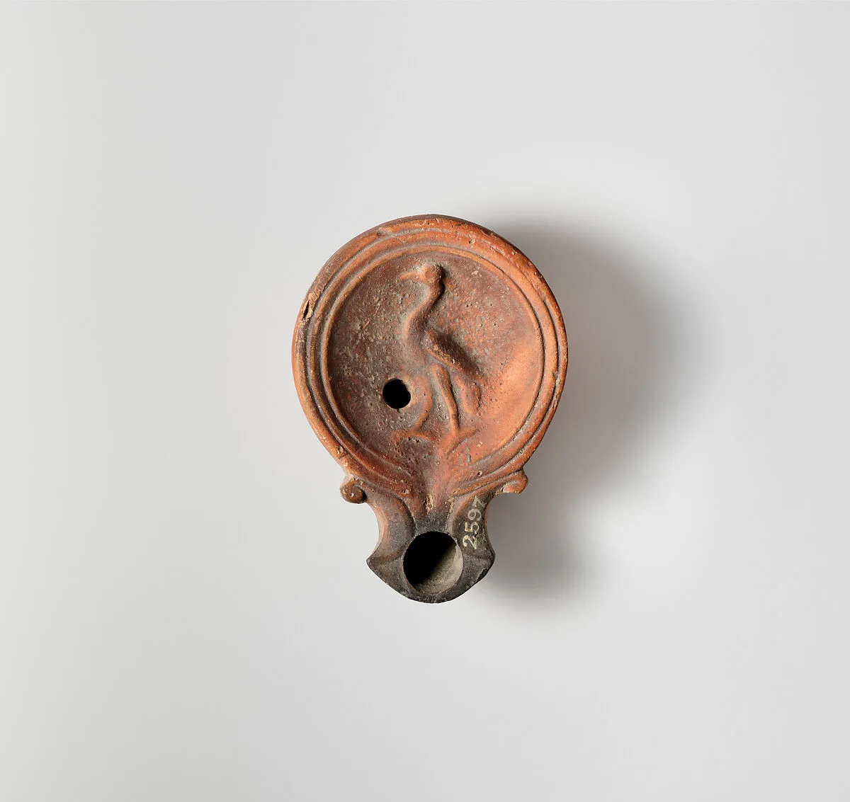Terracotta oil lamp — Unknown