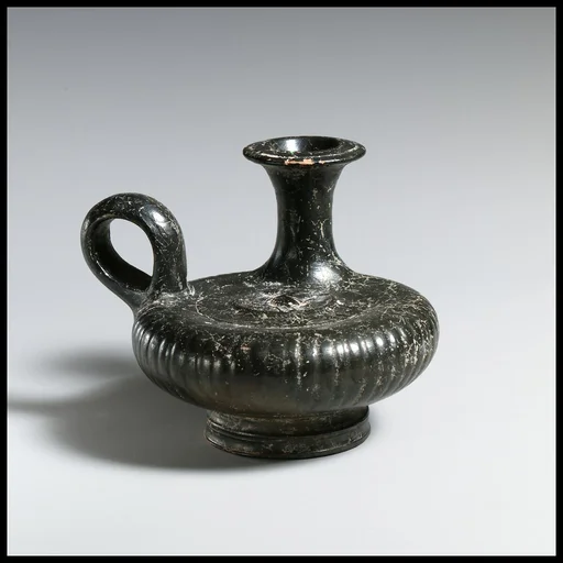 Terracotta guttus (flask with handle and vertical spout) with a depiction of a dog