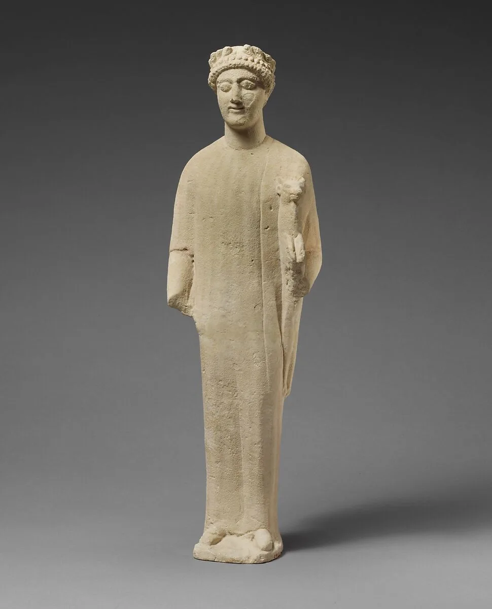 Limestone statuette of a beardless male votary with a wreath of leaves — Unknown