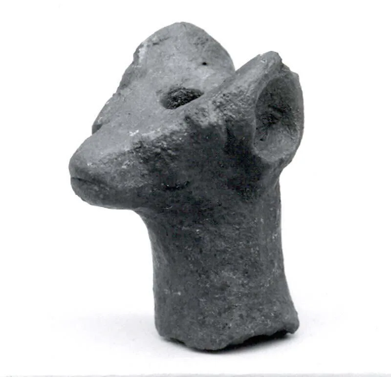 Spout in Shape of Figure — Unknown