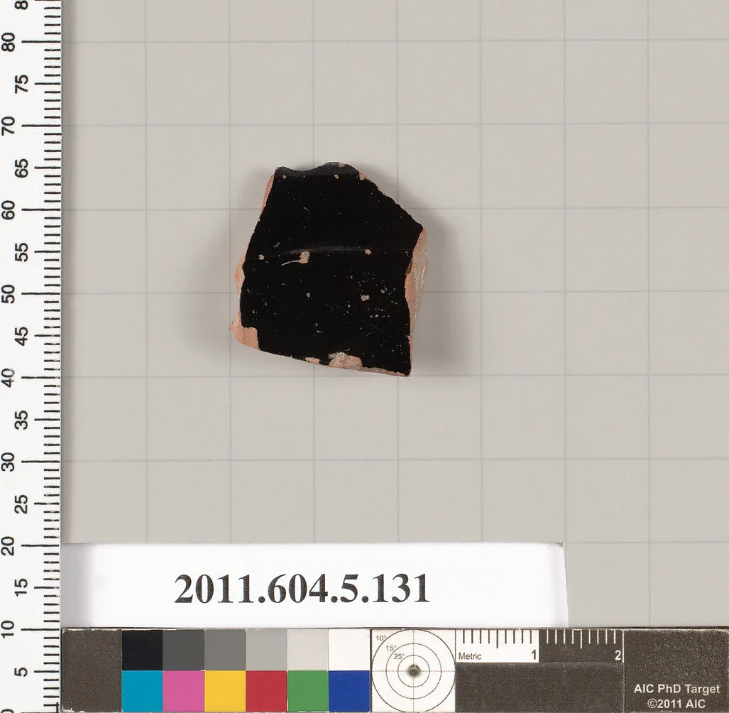 Terracotta fragment of a stemless kylix (drinking cup)? — Unknown