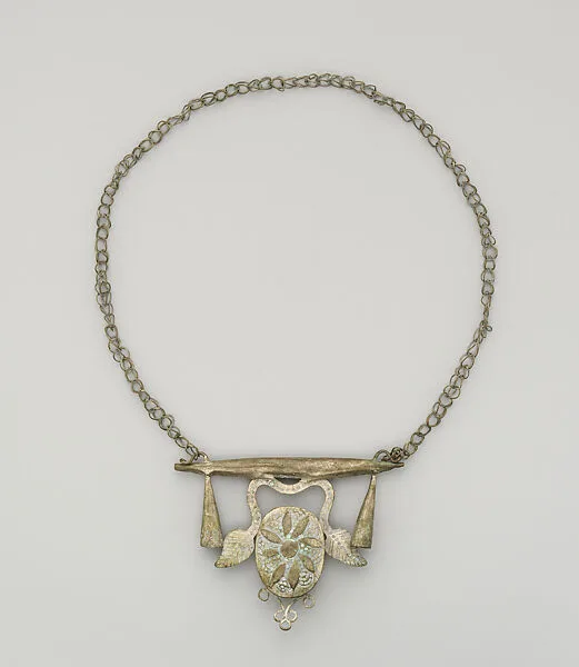 Necklace: Pendant (?) — Unknown