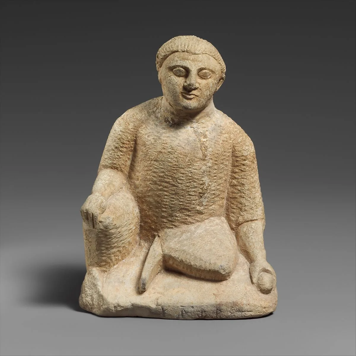 Limestone statuette of a temple boy — Unknown