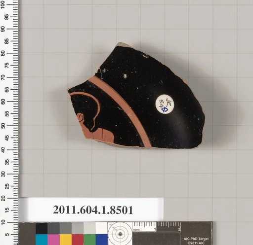 Terracotta fragment of a stemless kylix (drinking cup)