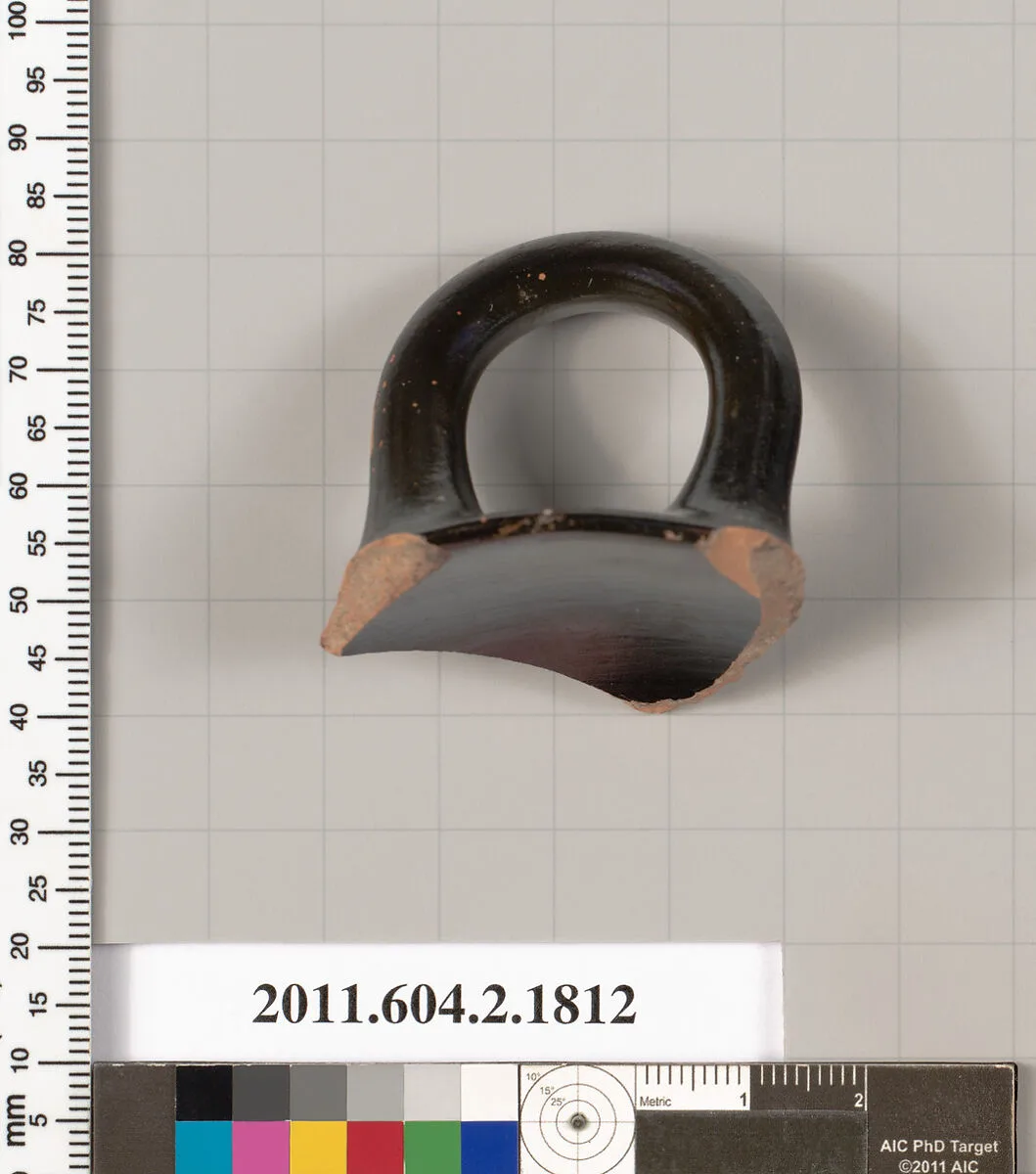 Terracotta rim fragment of a skyphos (deep drinking cup) — Unknown