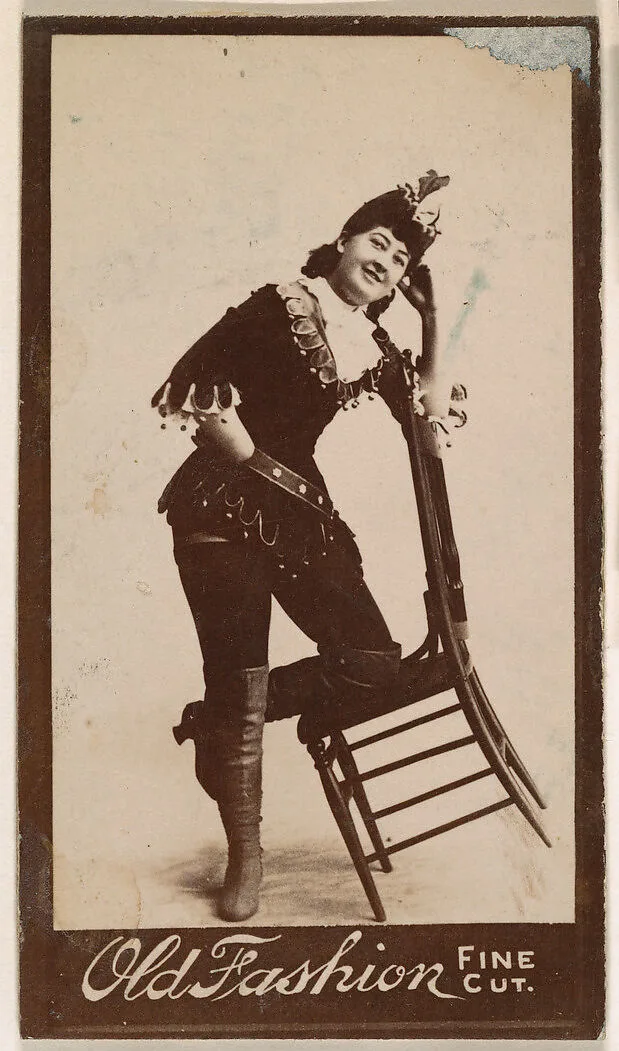 Actress posing on tilted chair, from the Actresses series (N664) promoting Old Fashion Fine Cut Tobacco — Unknown