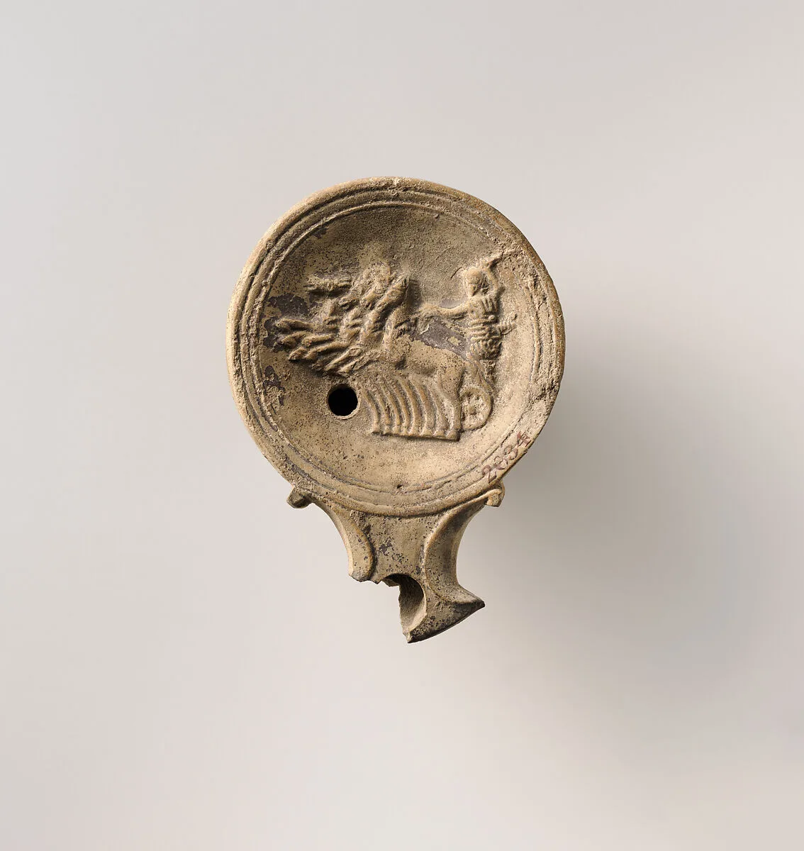 Terracotta oil lamp — Unknown