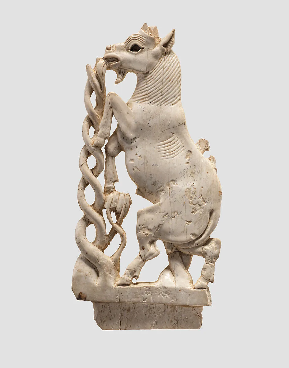 Openwork furniture plaque with a rearing goat — Unknown