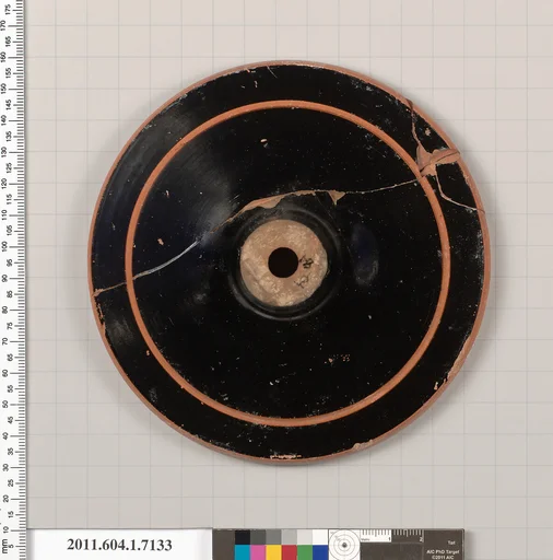 Terracotta fragment of a kylix (drinking cup)
