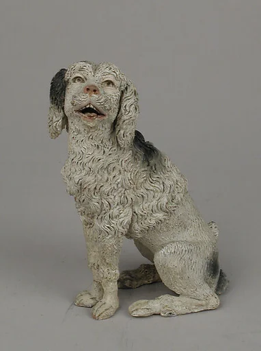 Seated poodle