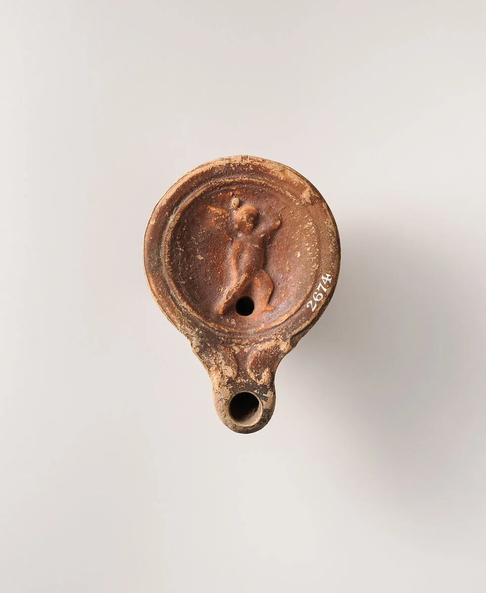 Terracotta oil lamp — Unknown