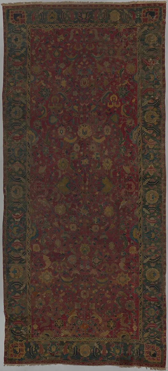 Indo-Persian carpet with vine scroll and palmette pattern — Unknown