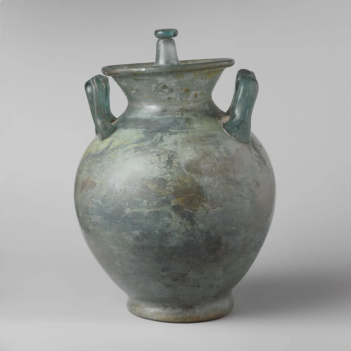 Glass cinerary urn with lid — Unknown
