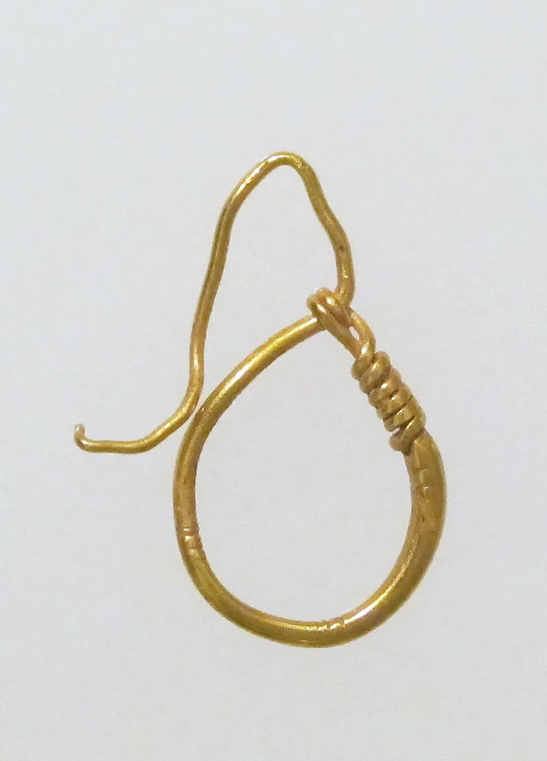 Earring, delta-shaped — Unknown