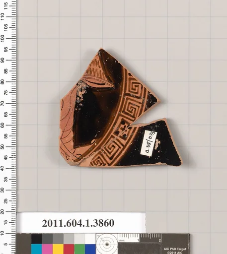 Terracotta fragment of a kylix (drinking cup)