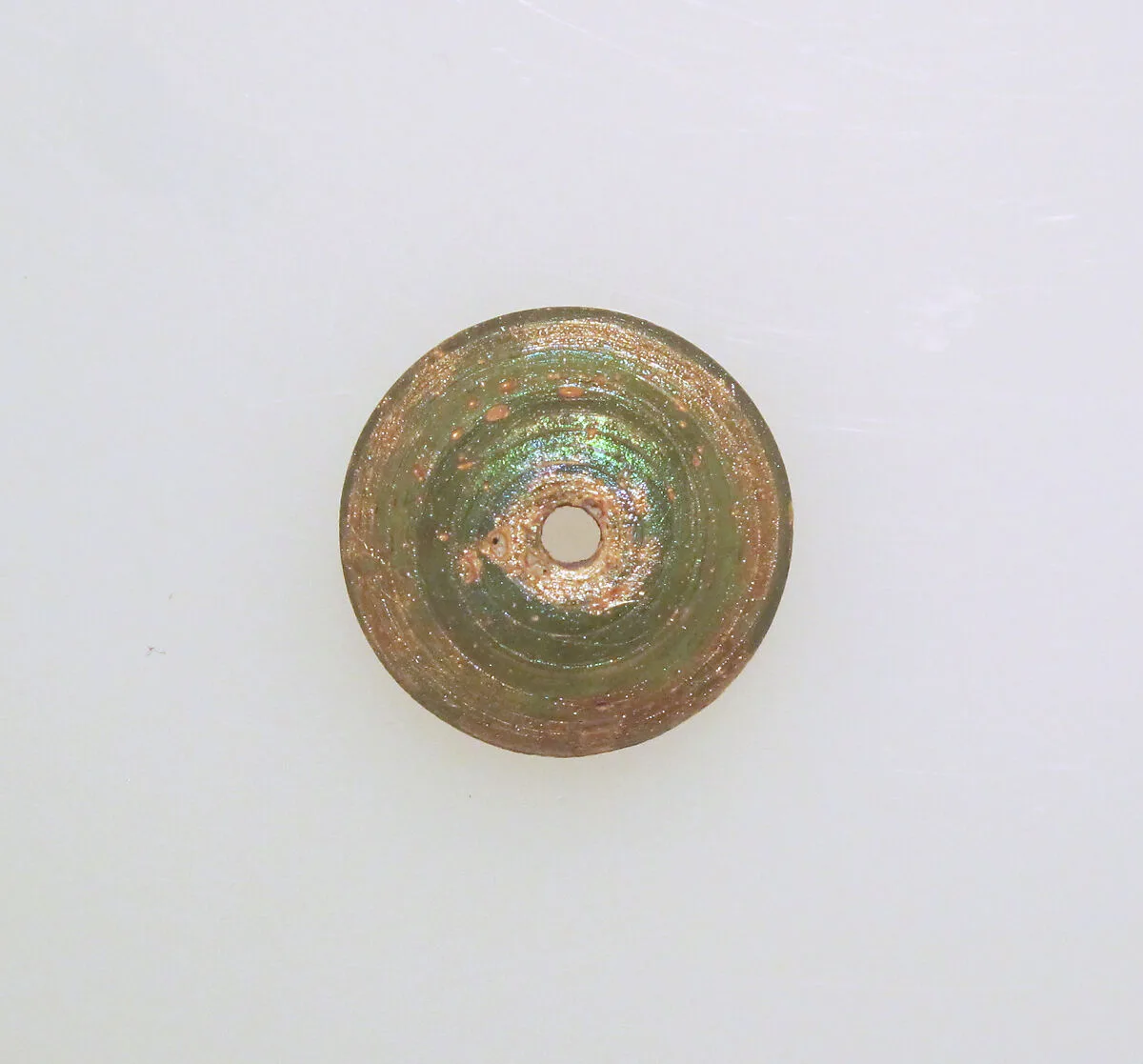 Glass spindle whorl — Unknown