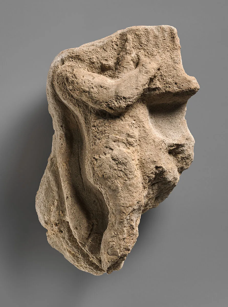 Fragment of a wall decoration with a figure playing a harp — Unknown