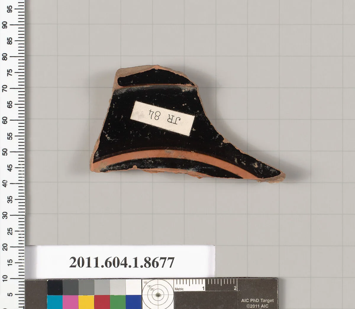 Terracotta fragment of a stemless kylix (drinking cup) — Unknown