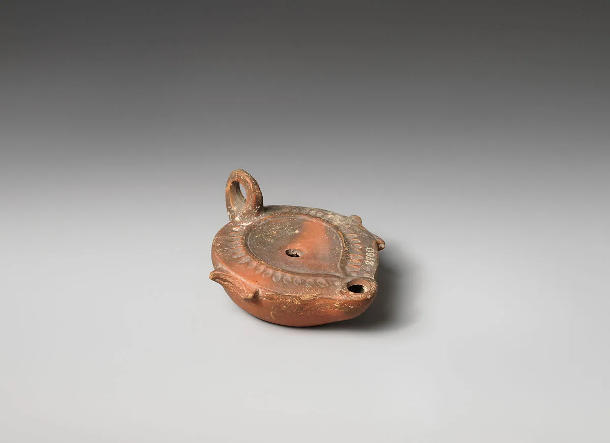 Terracotta oil lamp — Unknown