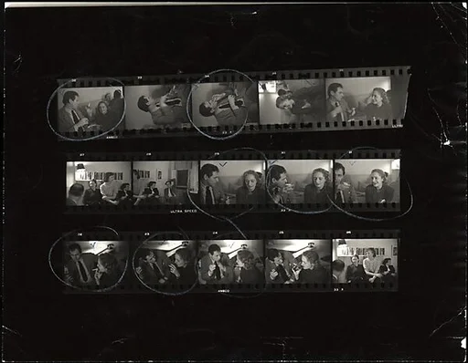 [Contact Sheet of 35mm Negatives: James Agee and Eleanor Clark in Conversation at Party]