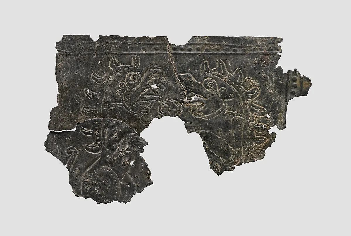 Fragments of plaque with fantastic creatures — Unknown