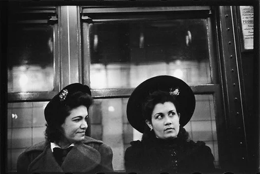 [Four 35mm Film Frames: Subway Passengers, New York City: Two Women in Hats]