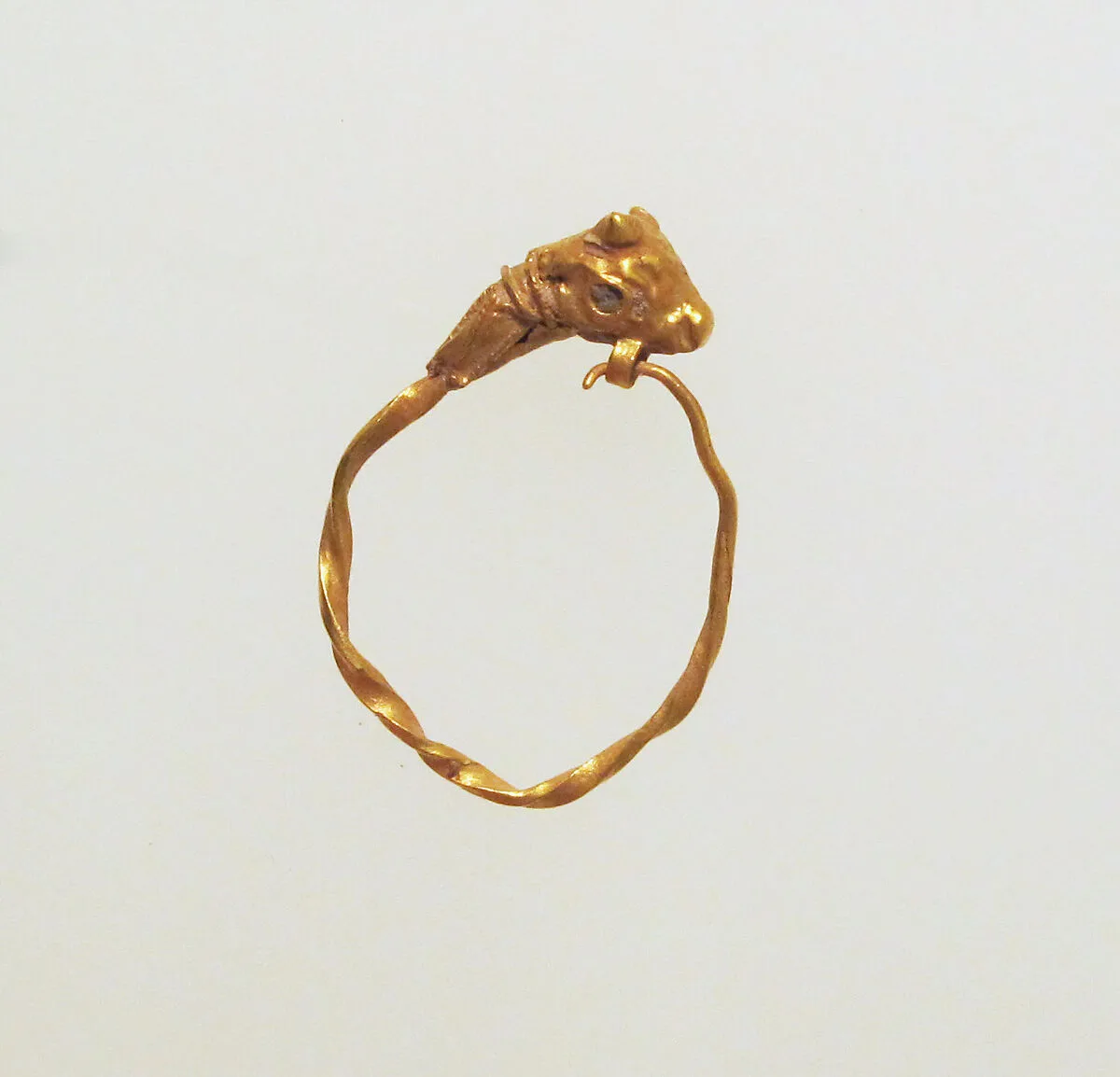 Gold earring with head of a bull — Unknown