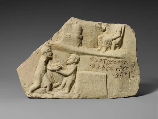 Limestone votive relief