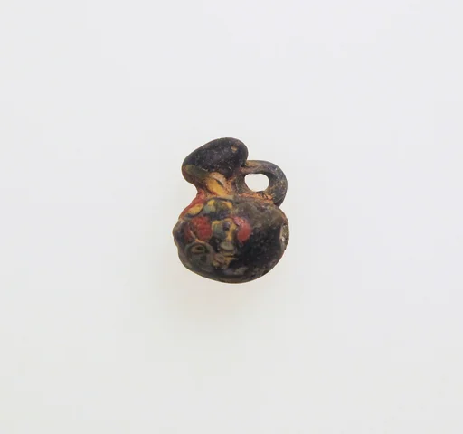 Glass pendant shaped like a jug