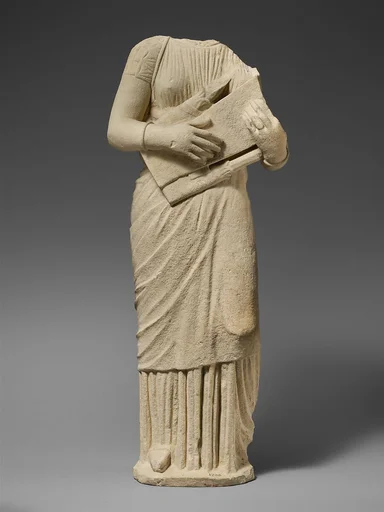 Limestone statue of a female lyre player