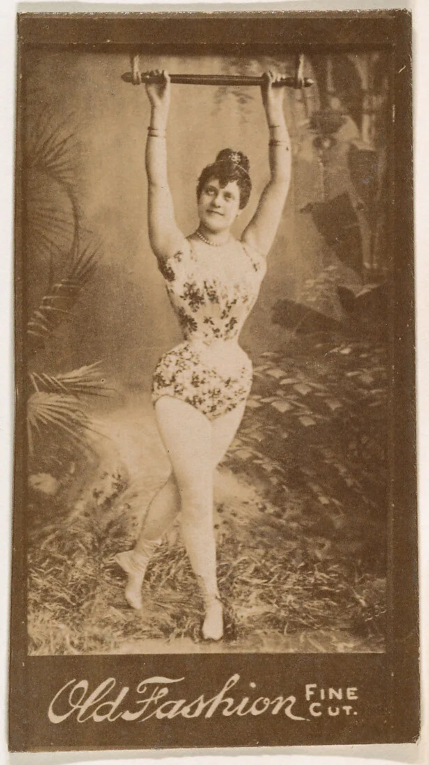 Actress holding onto metal bar above head, from the Actresses series (N664) promoting Old Fashion Fine Cut Tobacco — Unknown