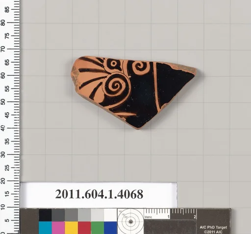 Terracotta fragment of a kylix (drinking cup)